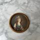 19th century miniature representing an elegant 18th century gilded frame