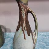 Two enameled stoneware pitchers