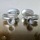 Paire de bougeoirs "cercles" en aluminium 1980