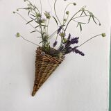 Brown wicker basket, wall decoration