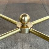 Brass coffee table with a white marble top.