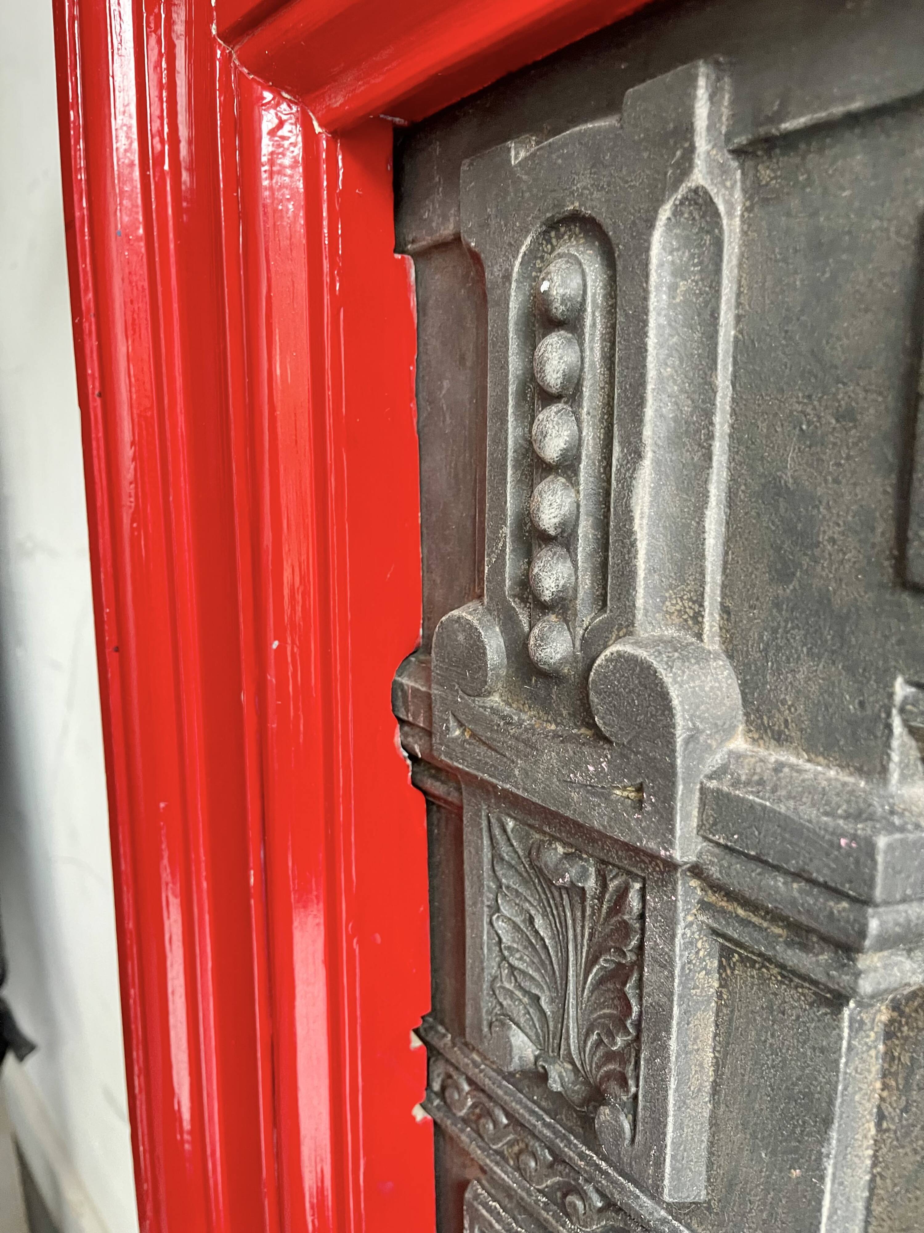 Cast Iron Fireplace with Wooden Surround