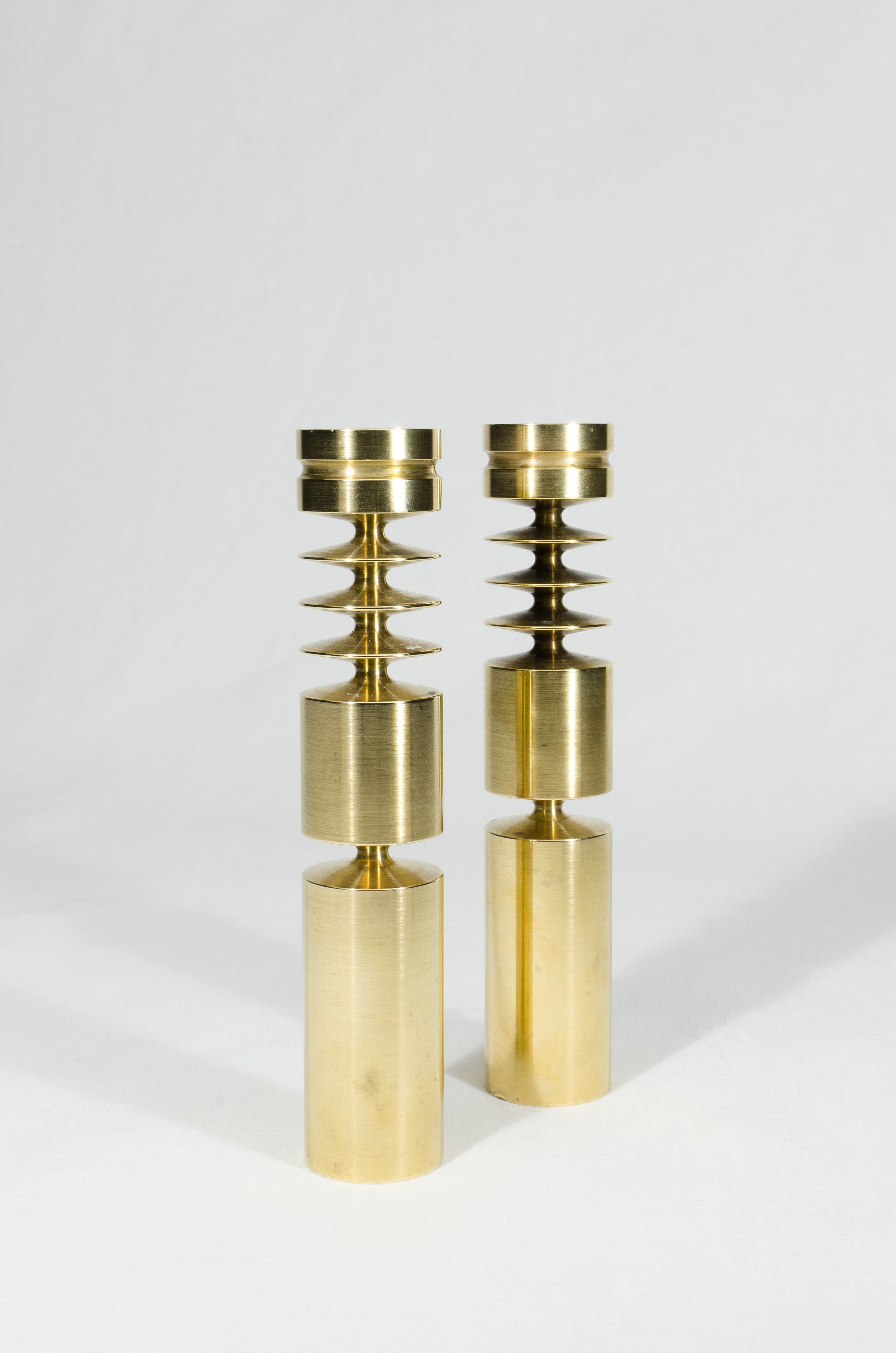 pair of scandinavian brass candlesticks  circa 1960