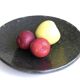 Round Accolay plate in black ceramic, 1960s centrepiece.