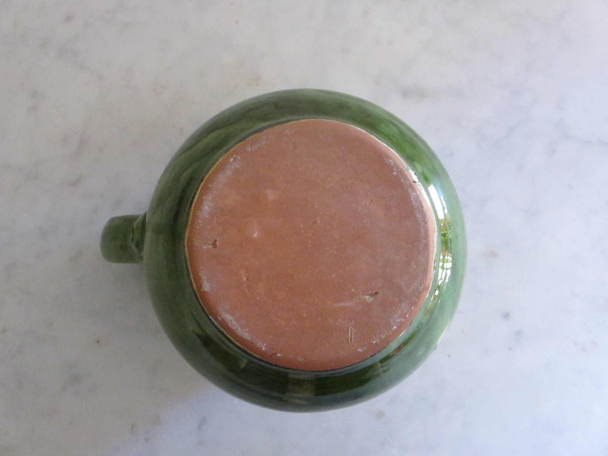 Glazed terracotta jug