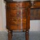 Regency style hardwood and leather kidney desk with gallery.