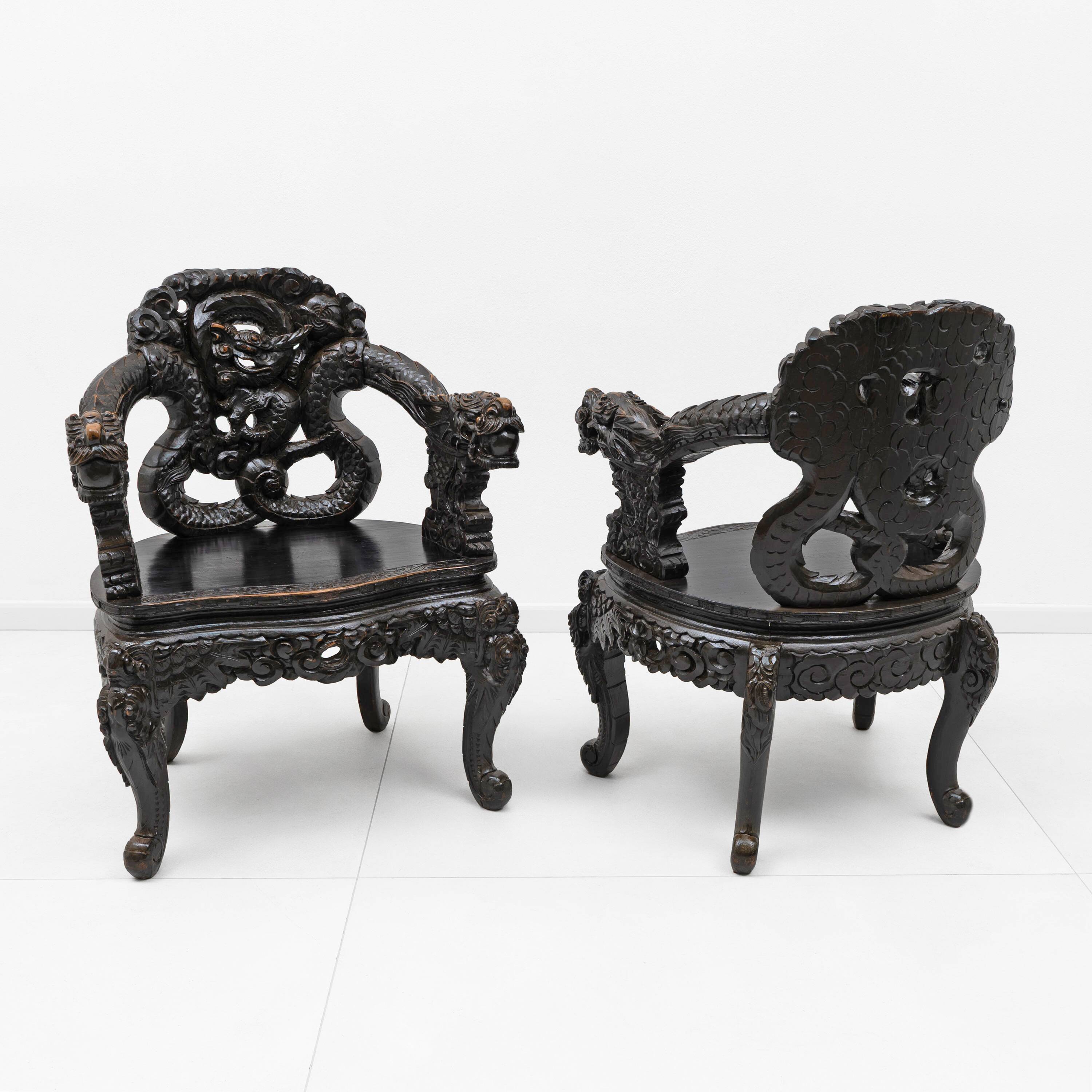 Pair of Chinese Qing Dynasty Carved Dragon Armchairs,Ebonized Hardwood,19th