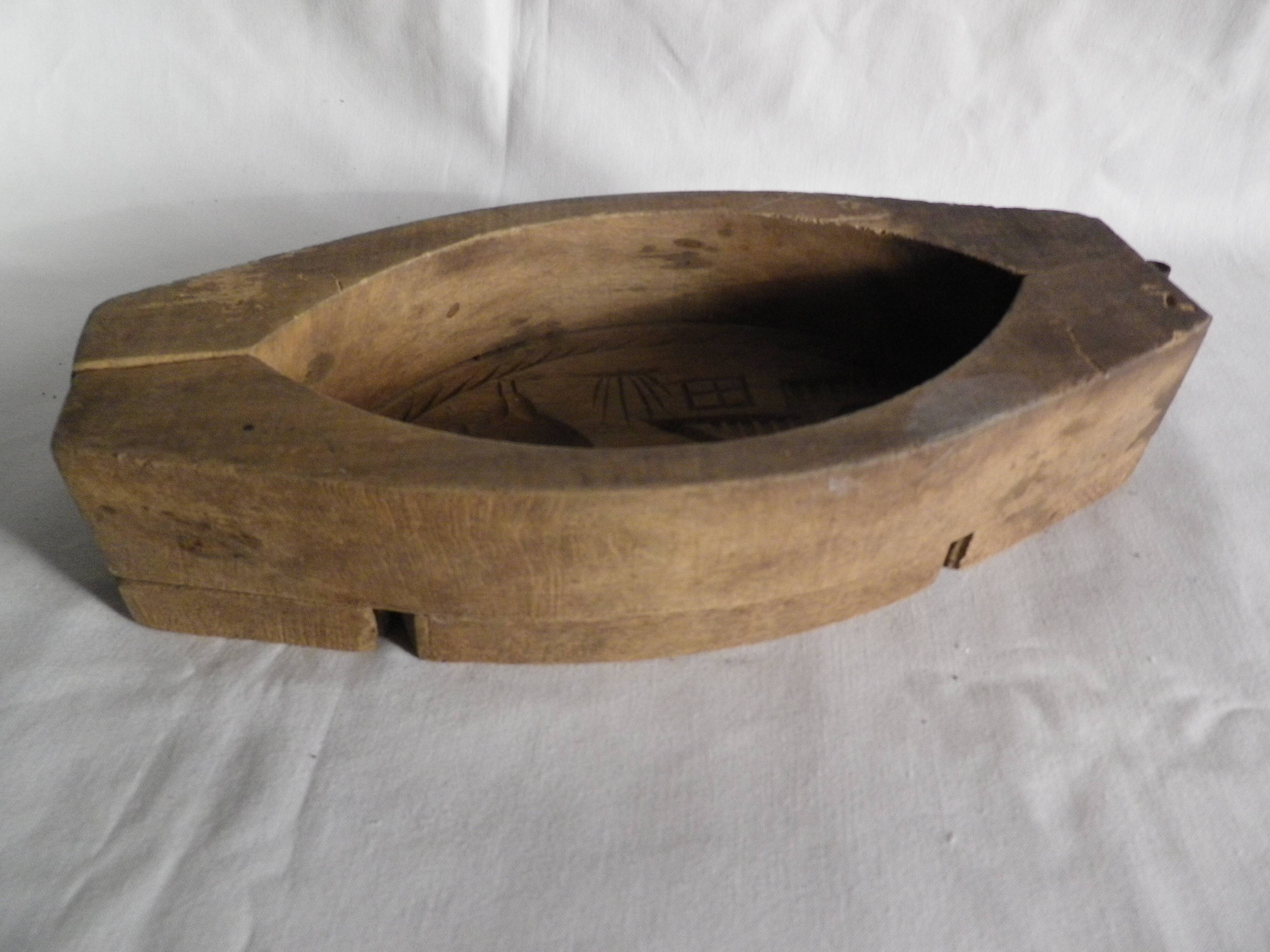 old wooden butter mold