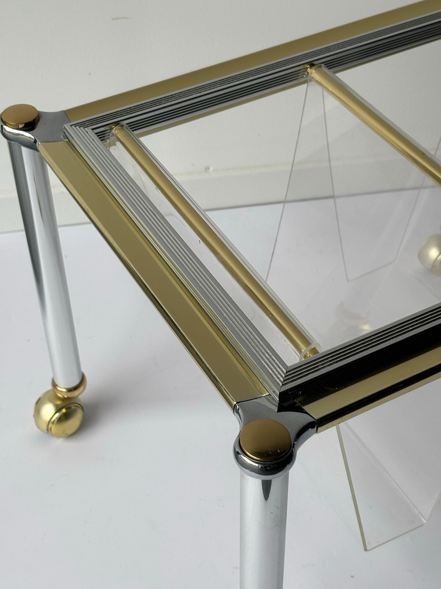 Magazine rack in Plexiglas and gold and chrome metal, 1970