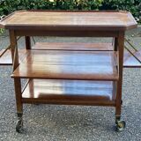 Vintage retractable tea trolley on wheels