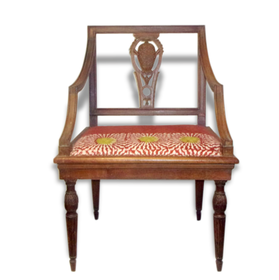A Chair from the beginning of the 20th century in natural wood.