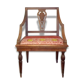 A Chair from the beginning of the 20th century in natural wood.