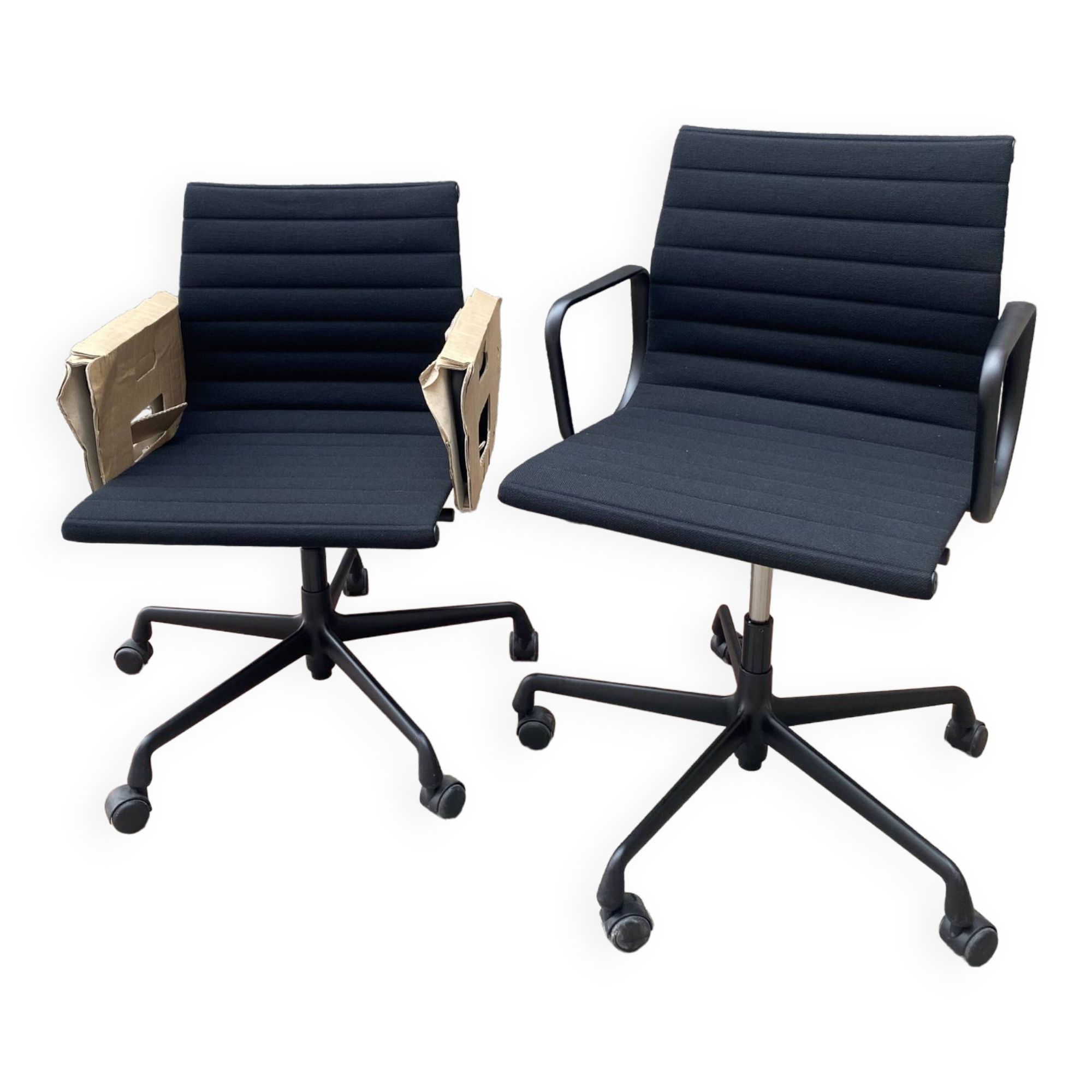 2 Charles Eames EA118 armchairs
