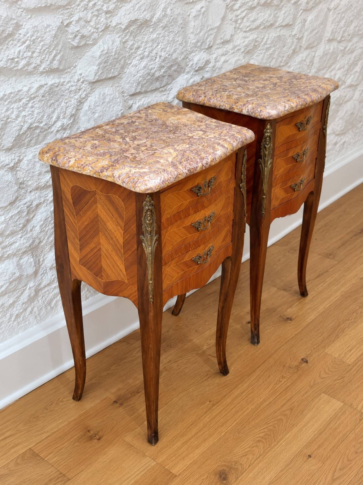 Pair of bedside tables in Louis XV style with 3 drawers, marquetry in rosewood.