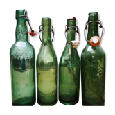 Lot 4 bottles old green glass lemonade