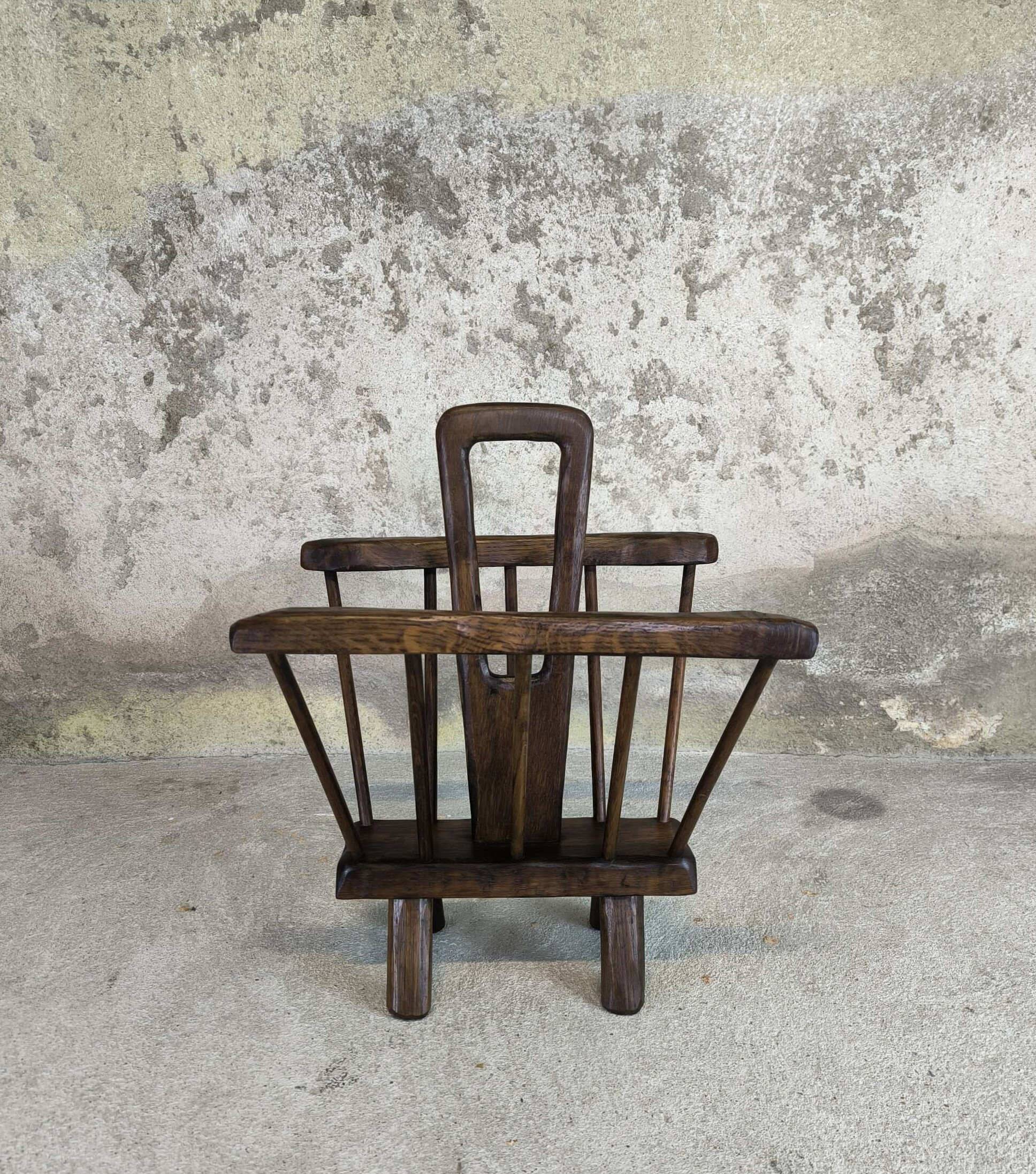 Vintage magazine rack in solid wood.