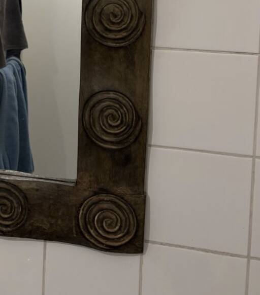 Wall mirror in carved wood (spiral patterns)