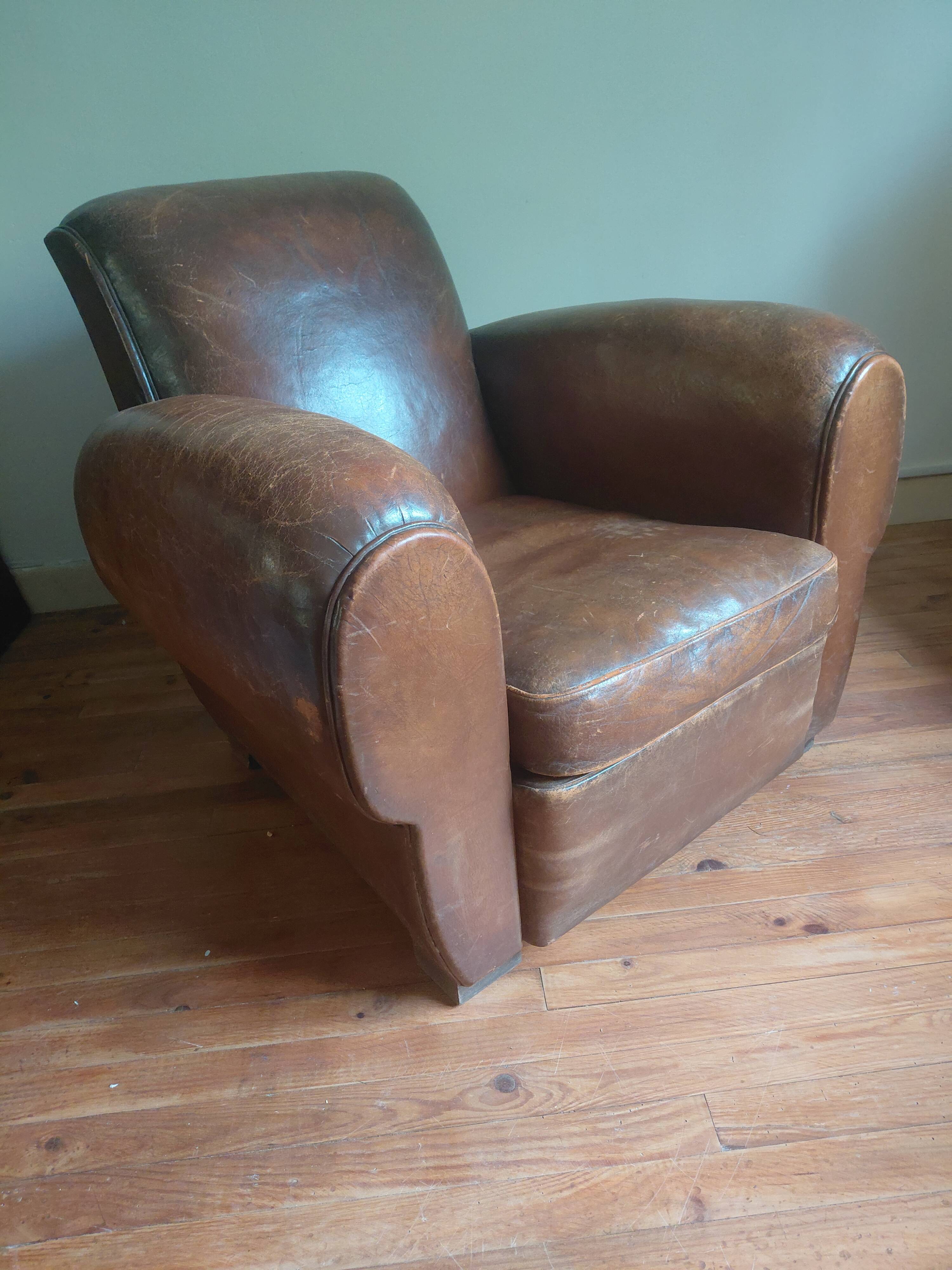 Club armchair, patinated leather