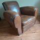 Club armchair, patinated leather