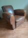Fauteuil club,  cuir patiné