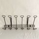Wall-mounted coat rack with 12 hooks in handcrafted wrought iron