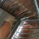 Table basse rotin et lien de cuir vintage 1970