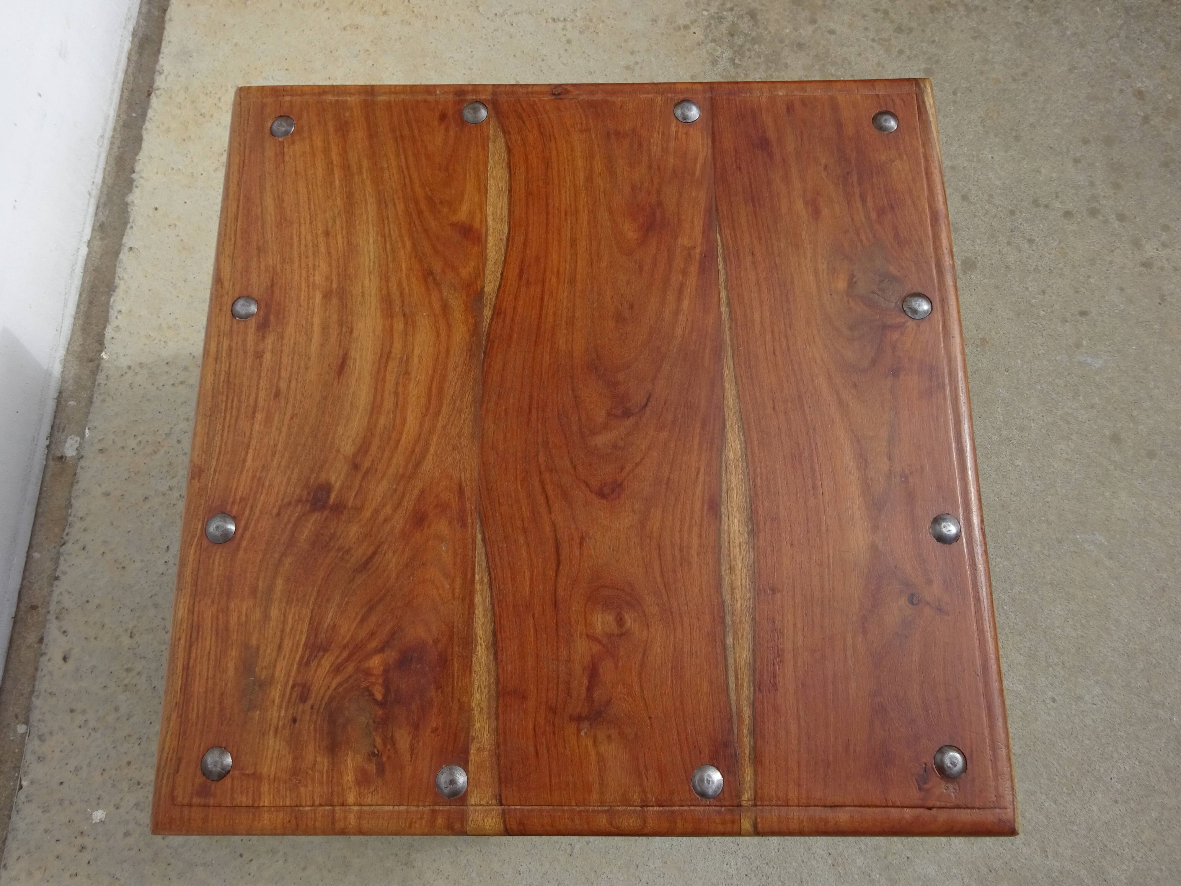 Square coffee table in exotic wood and wrought iron.