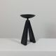 Vintage candle holder made of hand-forged metal, in a brutalist style.