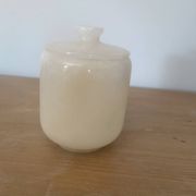 Small alabaster pot with its matching lid.