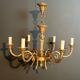 Bronze chandelier with ram's head motifs in the Louis XVI style, in the manner of Maison Jansen.