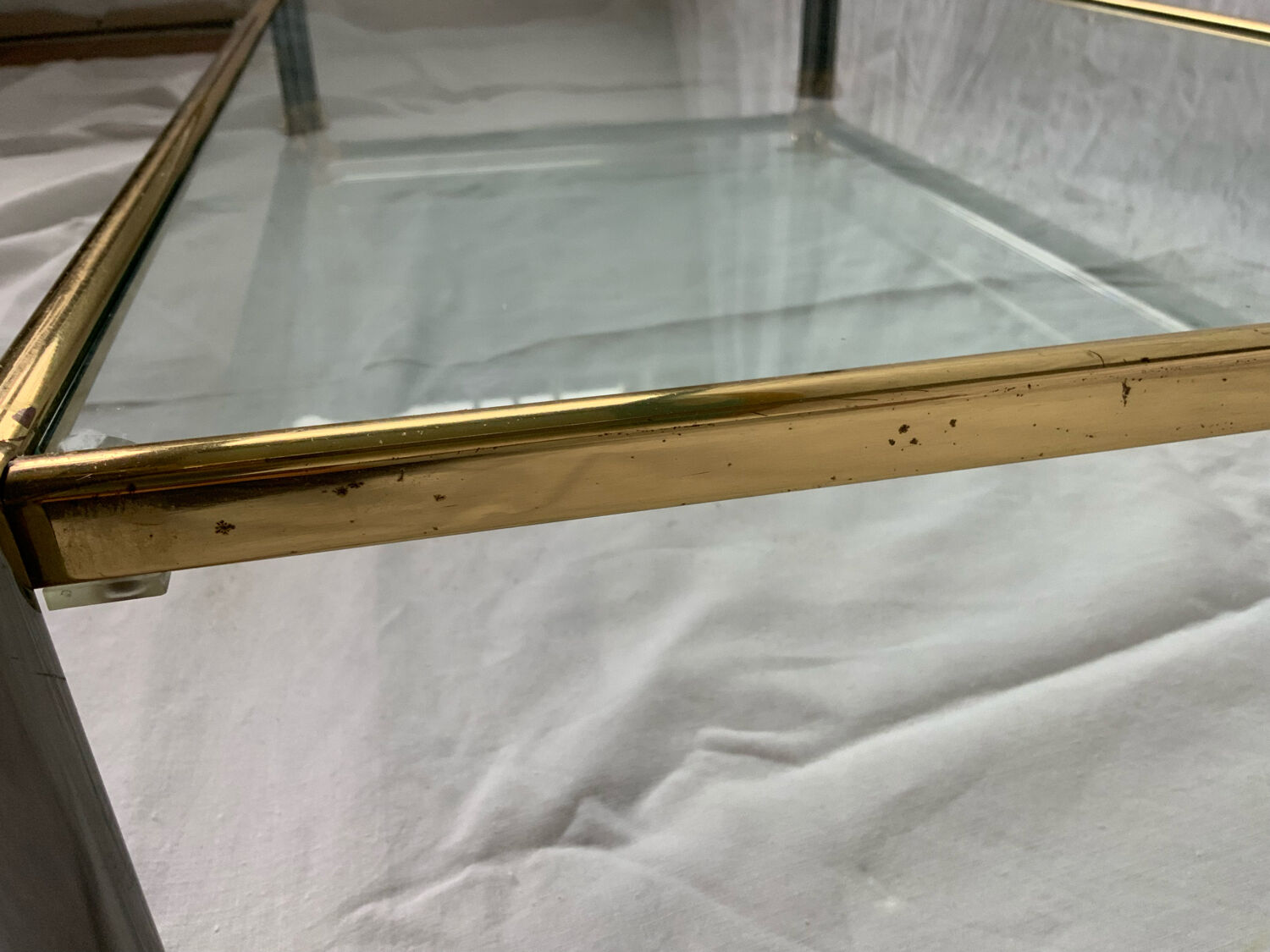 Glass and brass coffee table