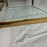Glass and brass coffee table