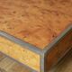 table basse en loupe d'orme avec bords chromés