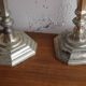 Pair of antique silver-plated metal candlesticks