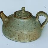 Vintage teapot in reeds