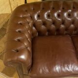 brown leather 2-seater Chesterfield sofa