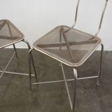 Vintage perforated metal chairs