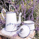 Old coffee maker in enamelled sheet metal
