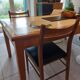 5 Scandinavian style chairs, wood and black faux leather.