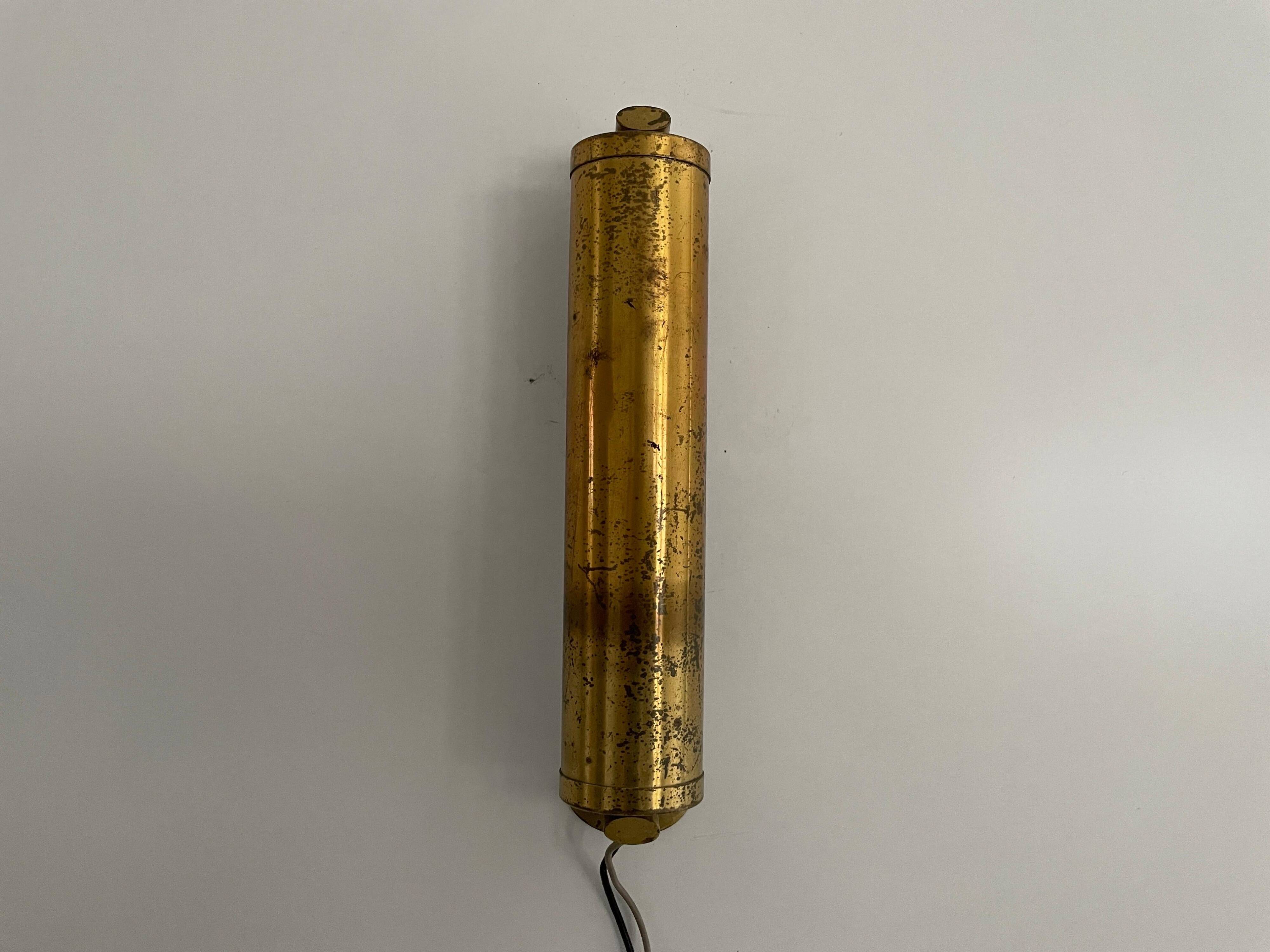 Small simple cylindrical brass wall light from the mid-century, 1950s, Germany.