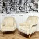 Paire de fauteuils pieds compas