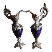 Pair of golden regulated ewers and blue glass