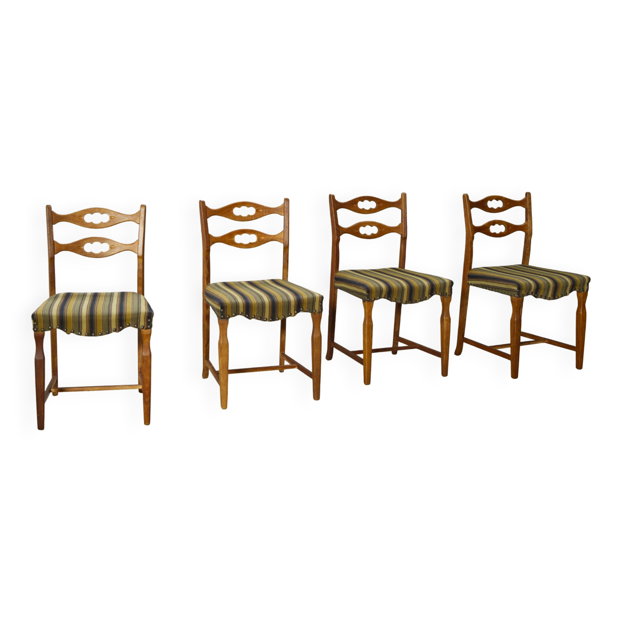 Set of four oak and wool dining room chairs by Henning Kjaernulf, 1960's