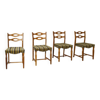 Set of four oak and wool dining room chairs by Henning Kjaernulf, 1960's