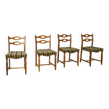 Ensemble de quatre chaises de salle à manger en chêne et laine par Henning Kjaernulf, années 1960.
