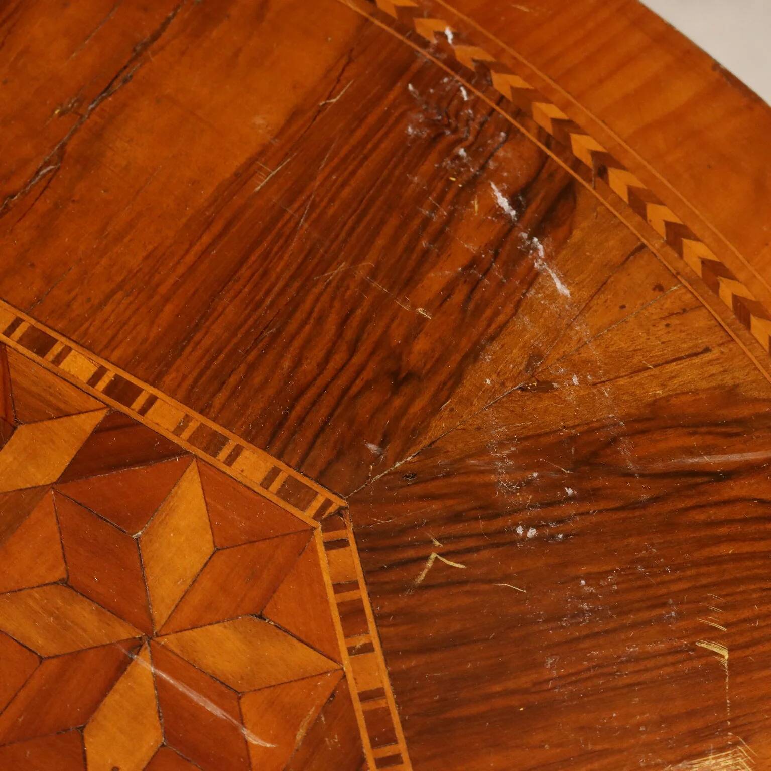 Antique round walnut table with a baluster central leg, Italy, 19th century.