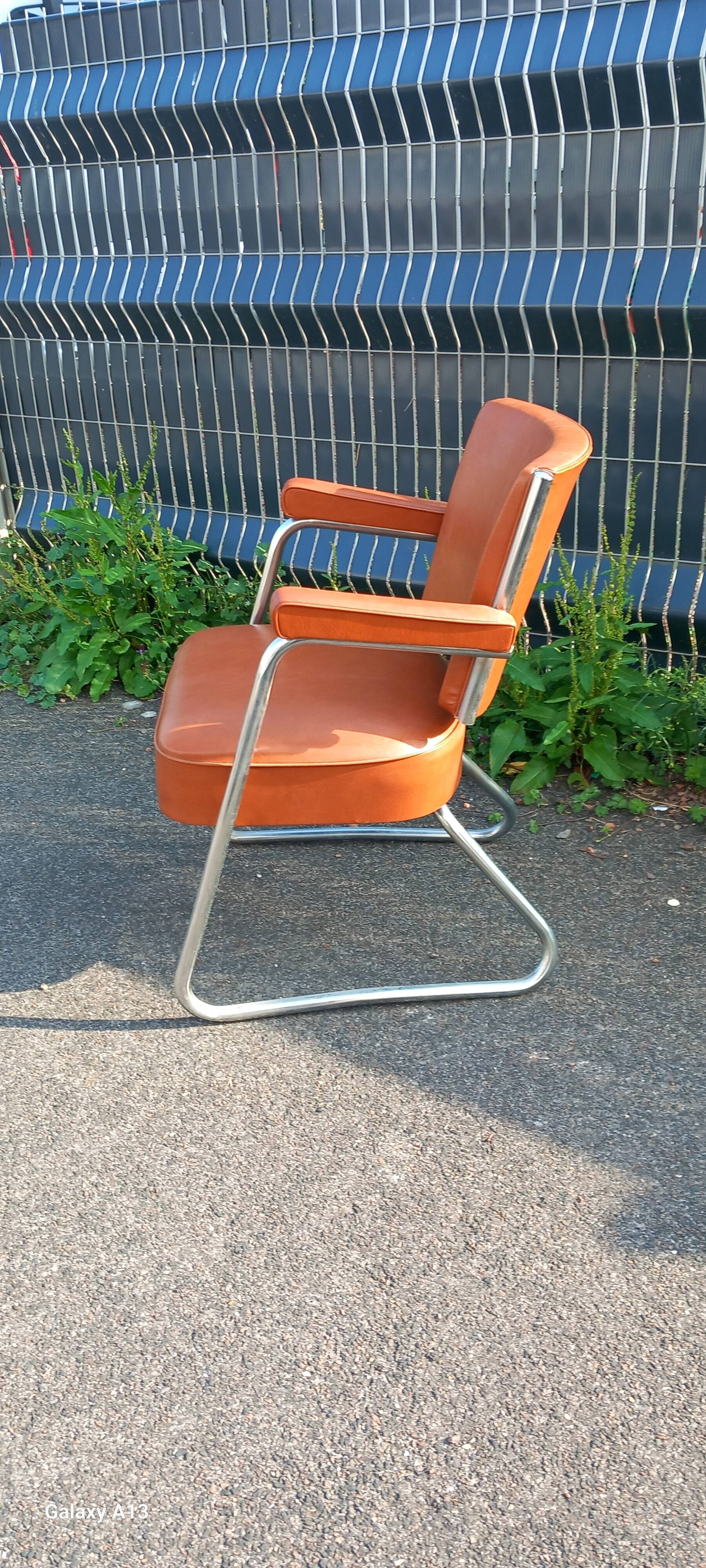 Vintage leatherette and chrome armchair