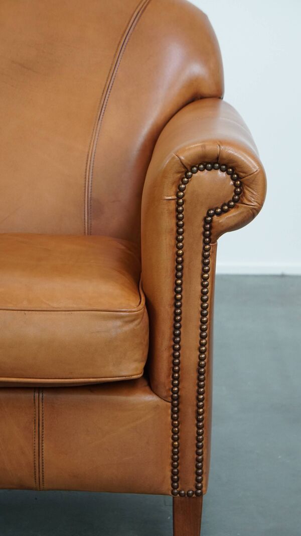 Fauteuil en cuir de vachette couleur cognac