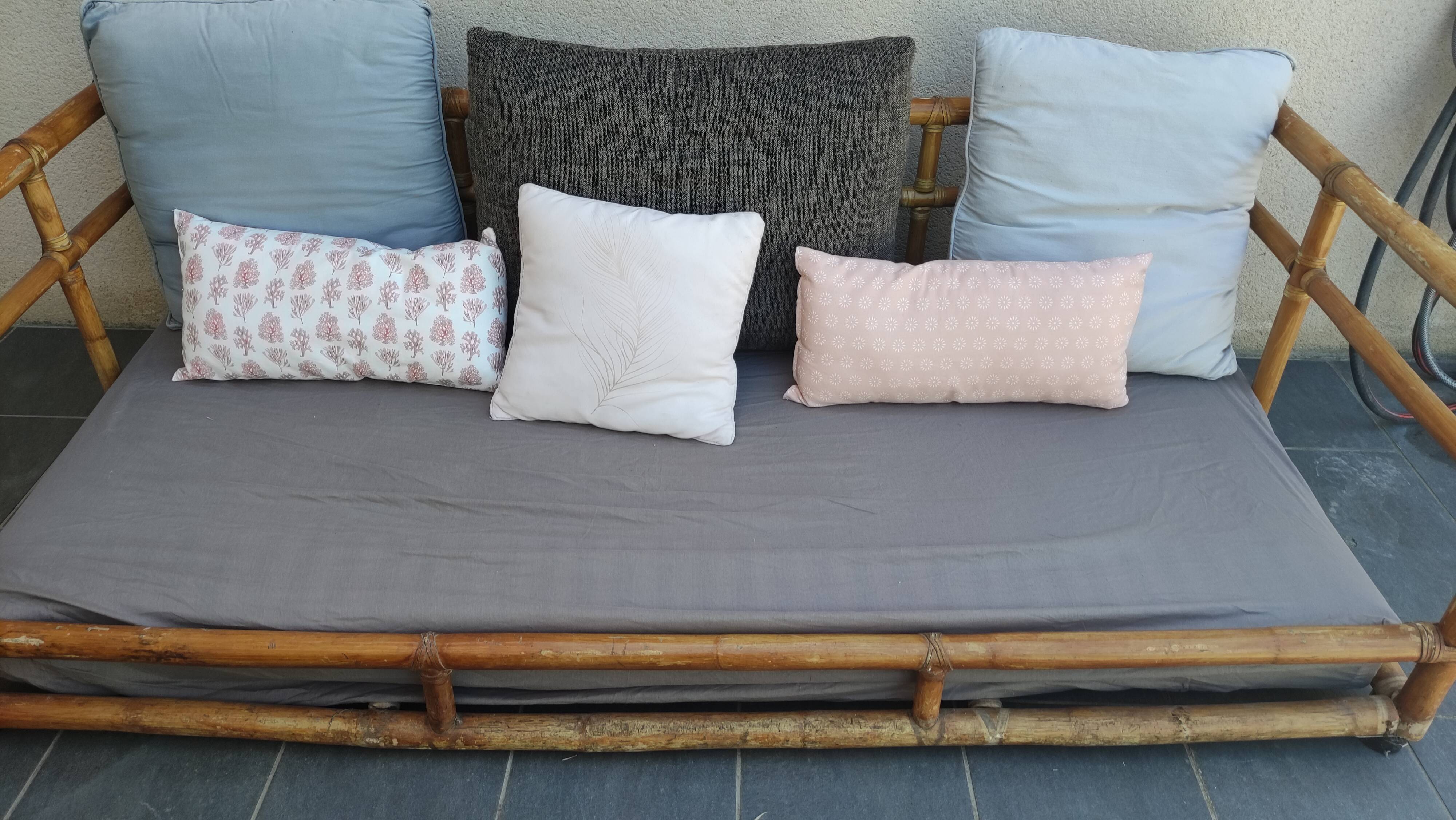 Large vintage rattan sofa bed
