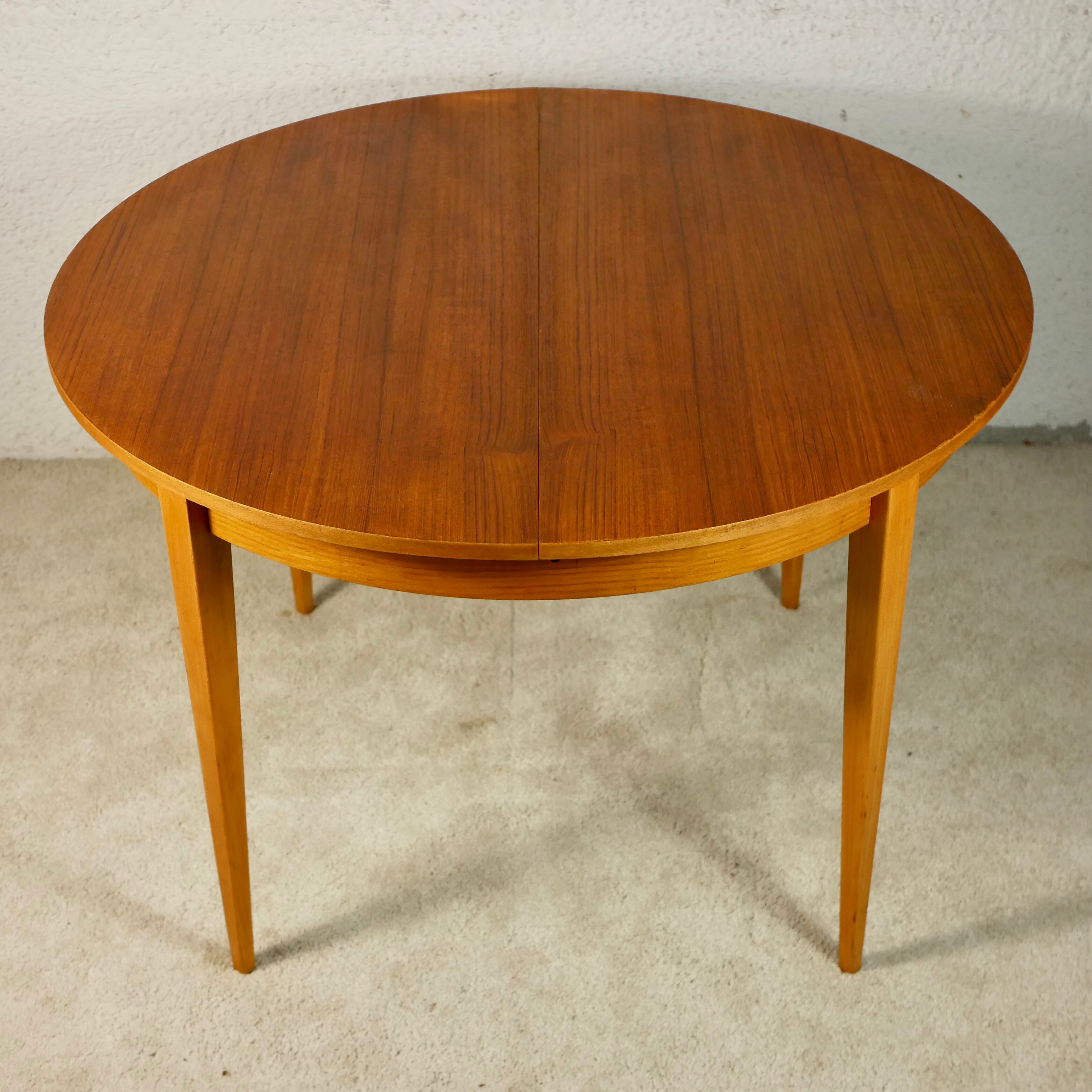 Scandinavian style teak table with butterfly extension